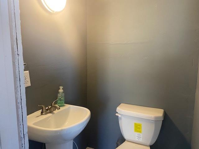 bathroom with a sink and toilet