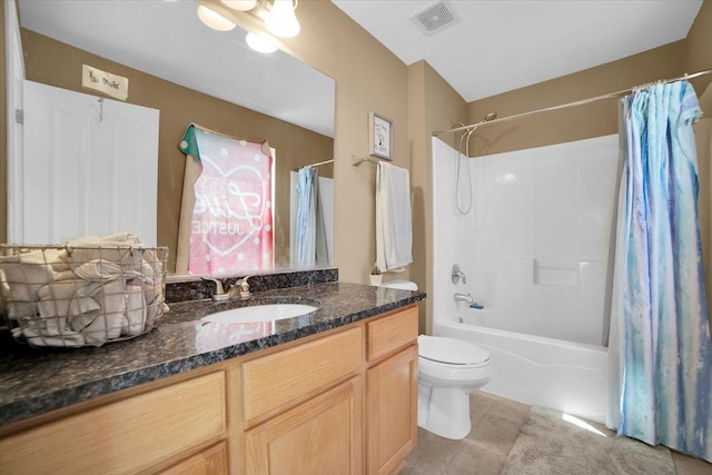 bathroom with tile patterned flooring, toilet, vanity, visible vents, and shower / tub combo with curtain