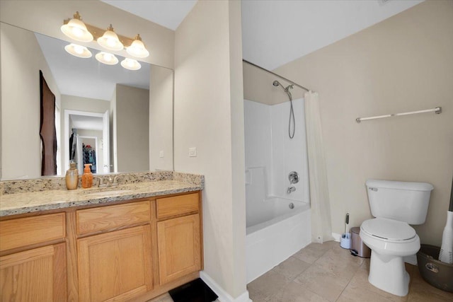 bathroom featuring toilet, tile patterned floors, washtub / shower combination, and vanity