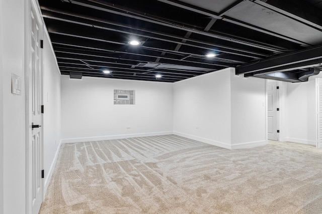 finished basement with carpet and baseboards