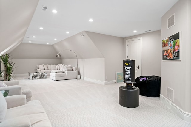 carpeted living area with lofted ceiling, baseboards, visible vents, and recessed lighting