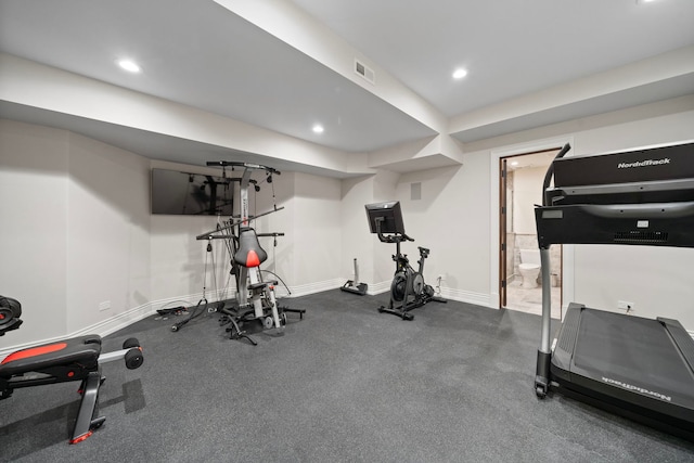 workout area with recessed lighting, visible vents, and baseboards