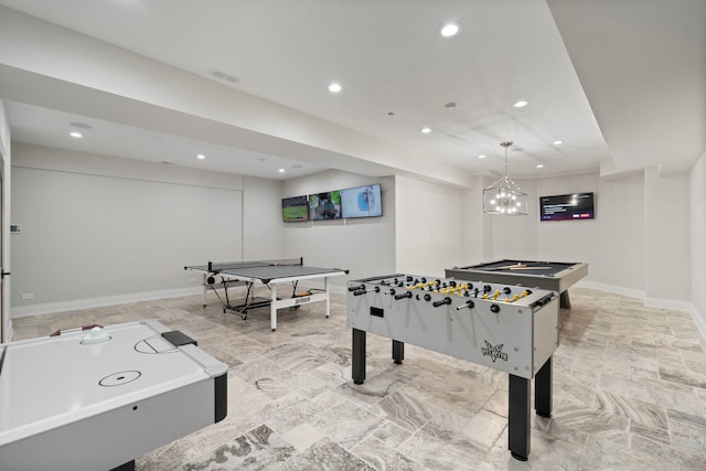 recreation room featuring baseboards, visible vents, and recessed lighting