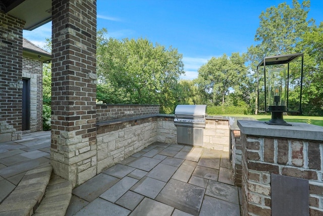 view of patio with grilling area and area for grilling