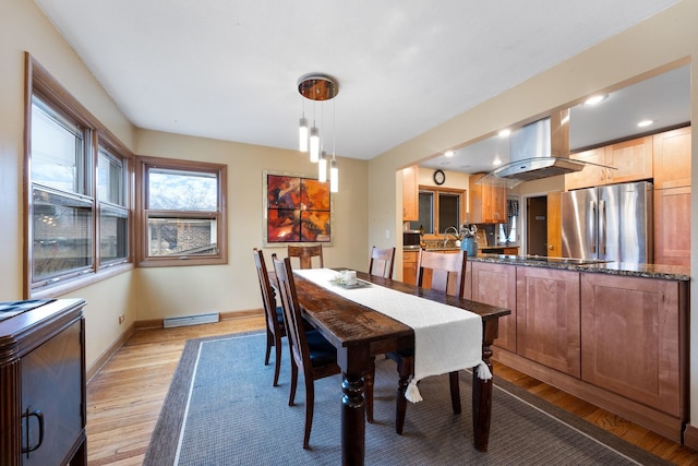 dining space with recessed lighting, baseboards, visible vents, and light wood finished floors