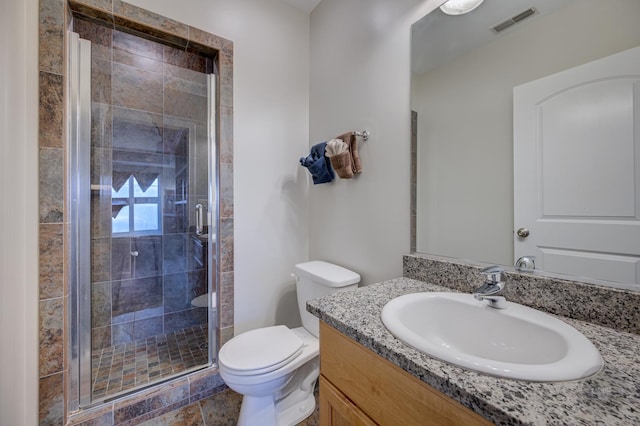 full bath featuring visible vents, a shower stall, toilet, and vanity