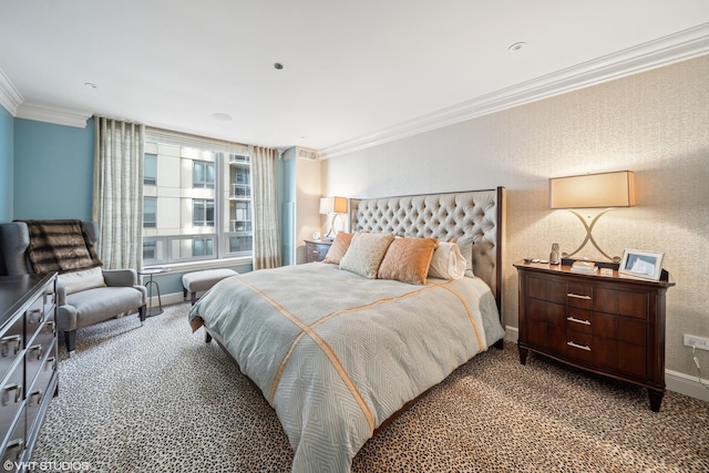 bedroom featuring ornamental molding, carpet, and baseboards