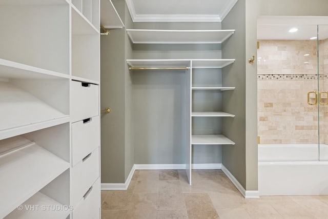 spacious closet with light tile patterned flooring