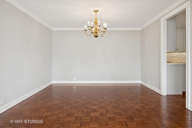 unfurnished room with baseboards, an inviting chandelier, and crown molding