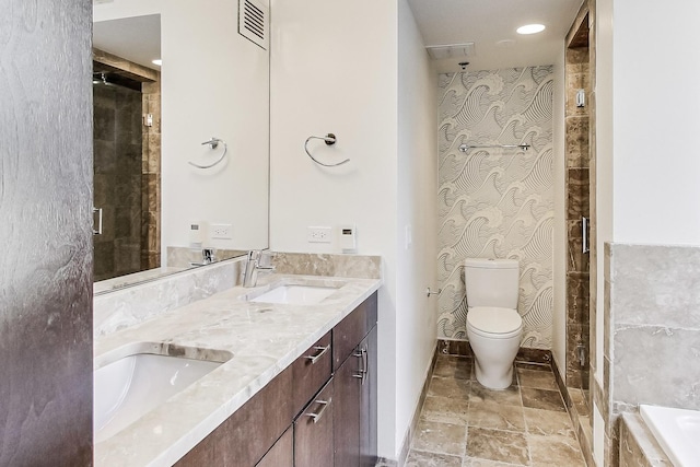 bathroom featuring a sink, visible vents, toilet, and a tile shower