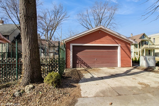 detached garage with fence