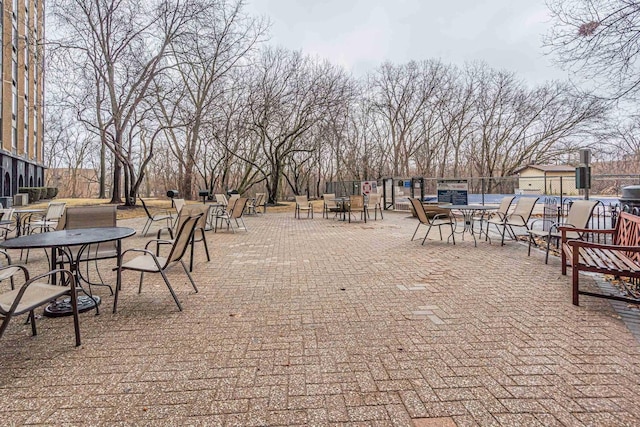 exterior space featuring a patio area and fence