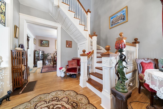 stairway with wood finished floors