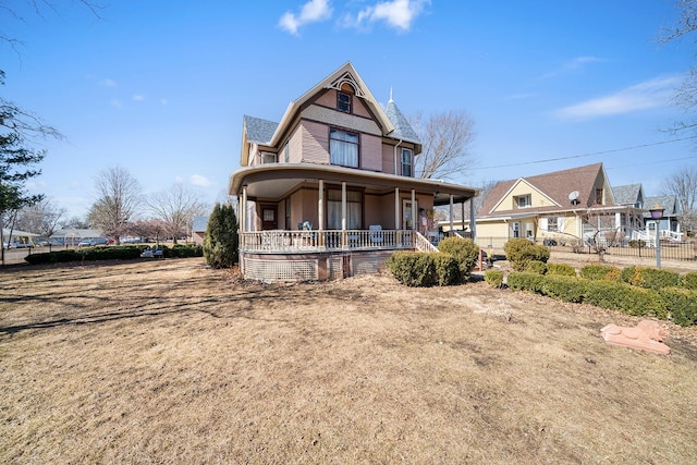 victorian home featuring covered porch