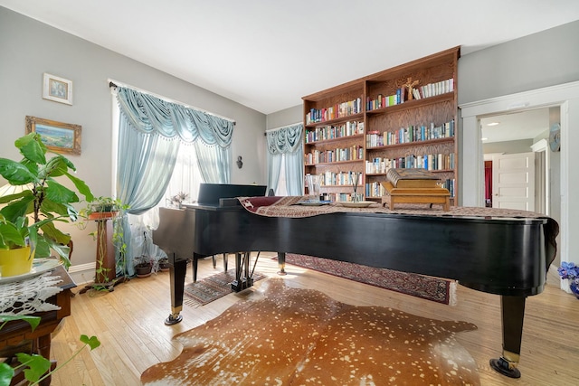 sitting room with hardwood / wood-style floors