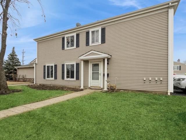 view of front of home with a front yard