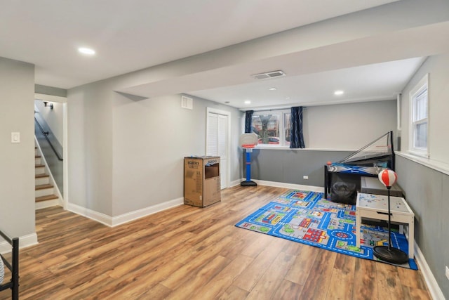 game room featuring recessed lighting, wood finished floors, visible vents, and baseboards