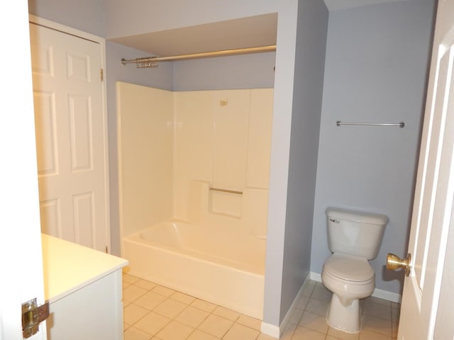 full bathroom featuring tile patterned flooring, baseboards, toilet, shower / bath combination, and vanity