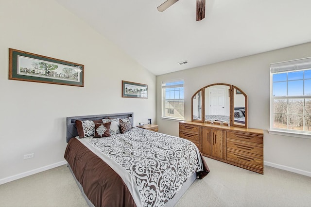 bedroom featuring visible vents, a ceiling fan, light carpet, vaulted ceiling, and baseboards