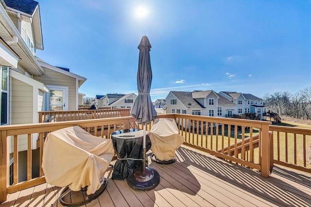 deck featuring a residential view and area for grilling