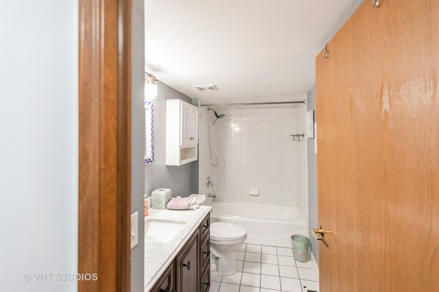 full bathroom with bathtub / shower combination, visible vents, toilet, vanity, and tile patterned flooring