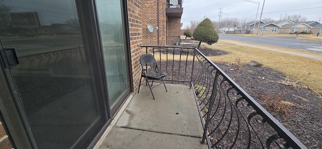 balcony featuring a residential view