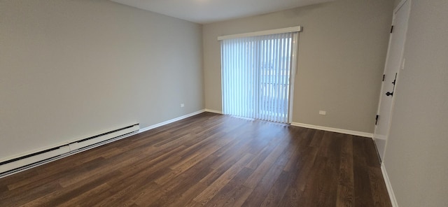 unfurnished room featuring dark wood-style floors, a baseboard radiator, and baseboards