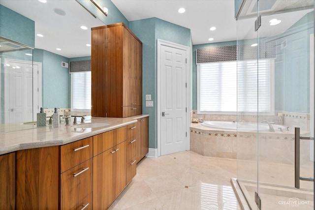 full bathroom featuring recessed lighting, a stall shower, vanity, a bath, and tile patterned floors