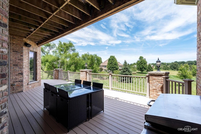 deck featuring outdoor dining space