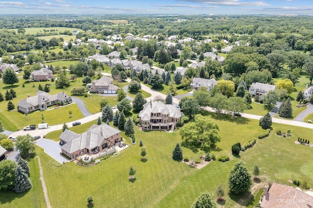 birds eye view of property with a residential view