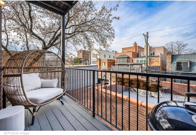 wooden deck featuring a residential view