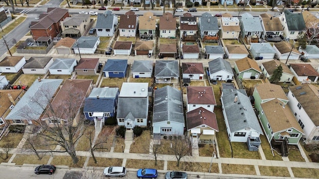 birds eye view of property with a residential view