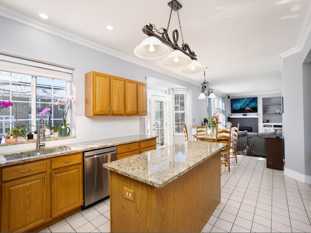 kitchen featuring a sink, crown molding, a kitchen island, and dishwasher