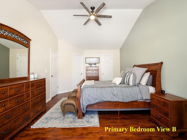 bedroom featuring vaulted ceiling, dark wood-type flooring, and baseboards