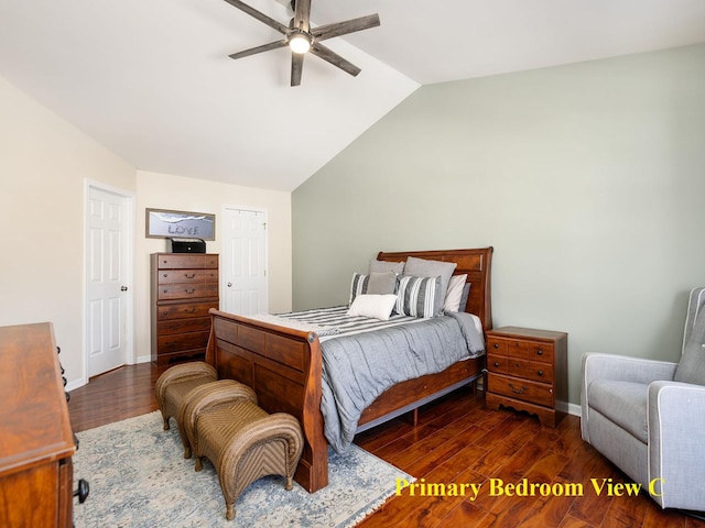 bedroom featuring ceiling fan, vaulted ceiling, baseboards, and wood finished floors