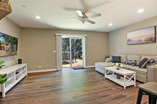 living room featuring visible vents, baseboards, dark wood finished floors, a ceiling fan, and recessed lighting