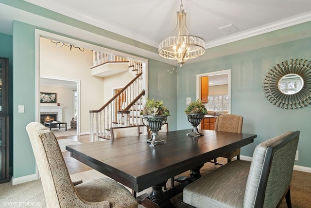 dining space with light carpet, stairs, baseboards, and a chandelier