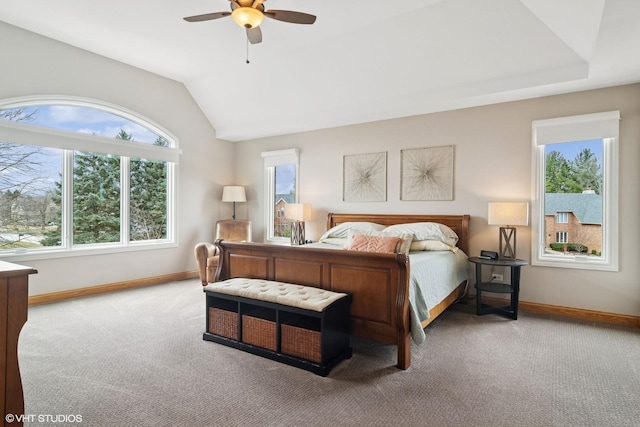 carpeted bedroom with baseboards, lofted ceiling, and ceiling fan
