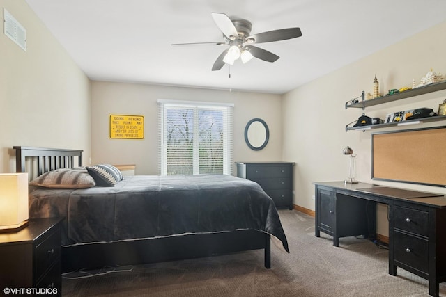 bedroom with baseboards, ceiling fan, visible vents, and carpet