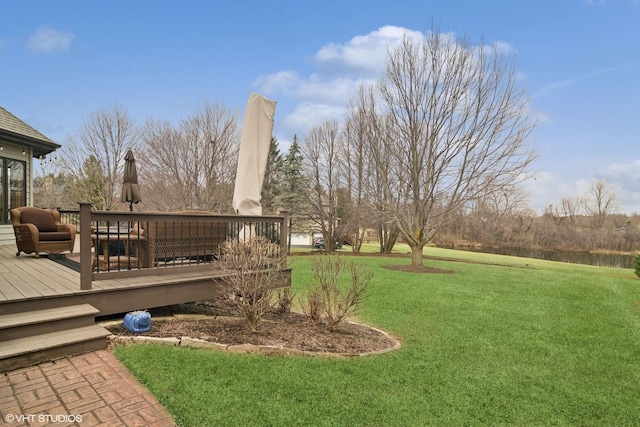 view of yard with a wooden deck