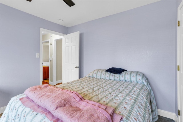 bedroom with baseboards and a ceiling fan