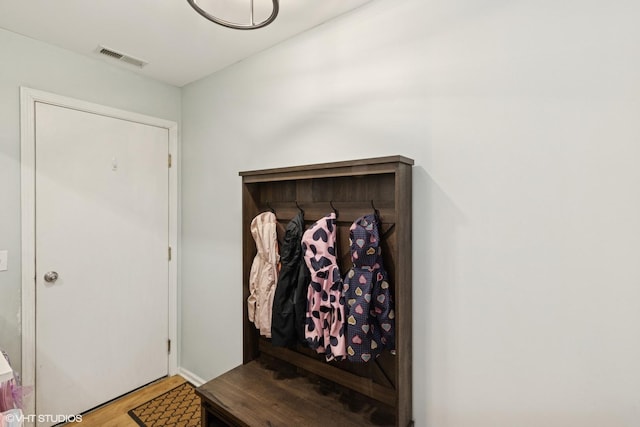 mudroom with visible vents and wood finished floors