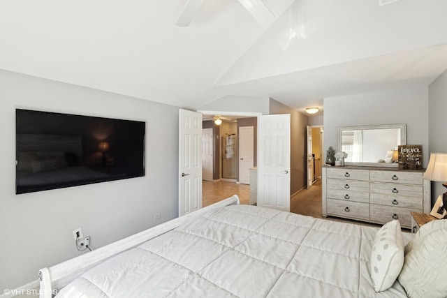 bedroom with lofted ceiling and ceiling fan