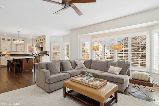 living room with recessed lighting, wood finished floors, and ceiling fan