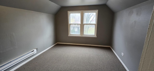 additional living space featuring carpet floors, a baseboard radiator, and baseboards