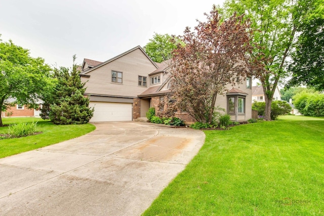 621 Raintree Rd, Buffalo Grove, IL 60089 - view of front of home featuring a garage, driveway, a front lawn, and roof with shingles