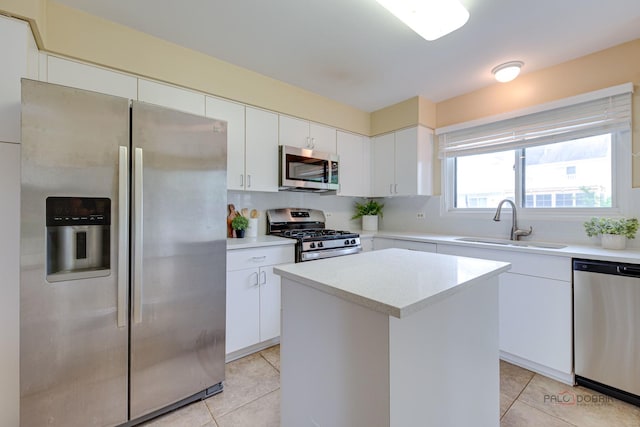 621 Raintree Rd, Buffalo Grove, IL 60089 - kitchen with appliances with stainless steel finishes, light tile patterned flooring, and light countertops
