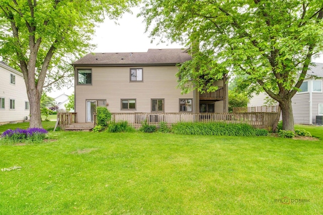 621 Raintree Rd, Buffalo Grove, IL 60089 - back of house featuring a lawn and a wooden deck