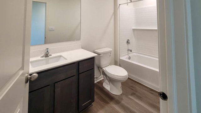 full bathroom with toilet, shower / bath combination, wood finished floors, and vanity