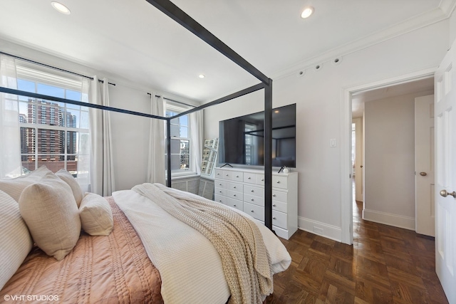 bedroom with crown molding, multiple windows, recessed lighting, and baseboards